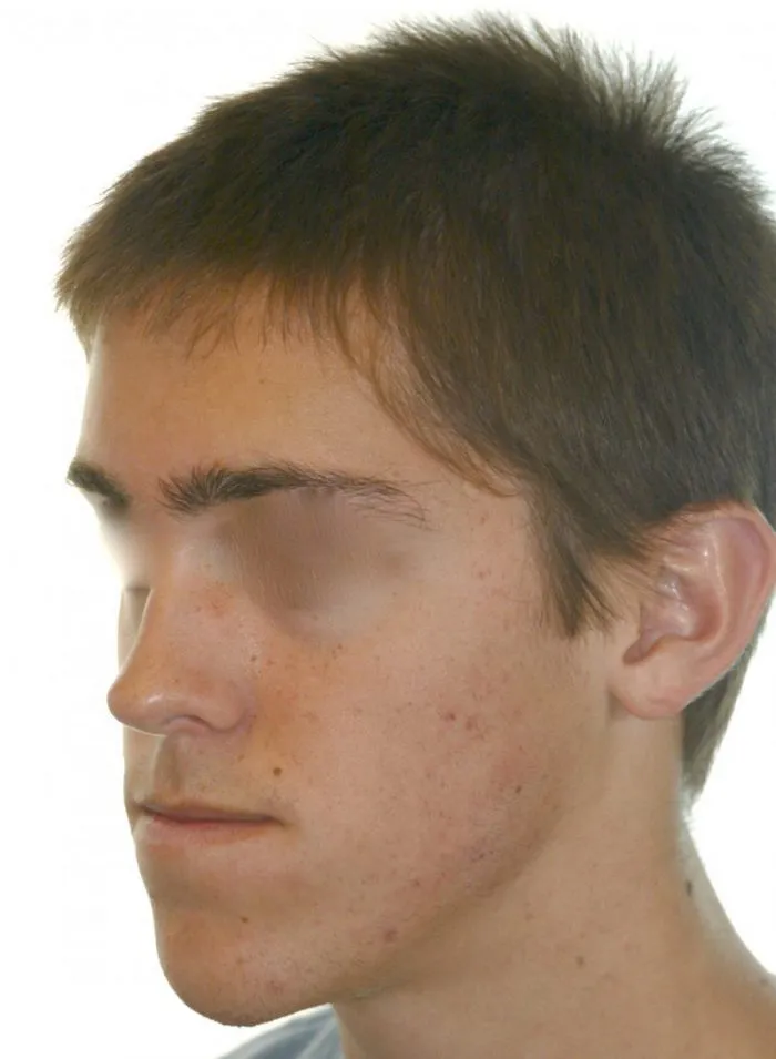 left side view of young boy 